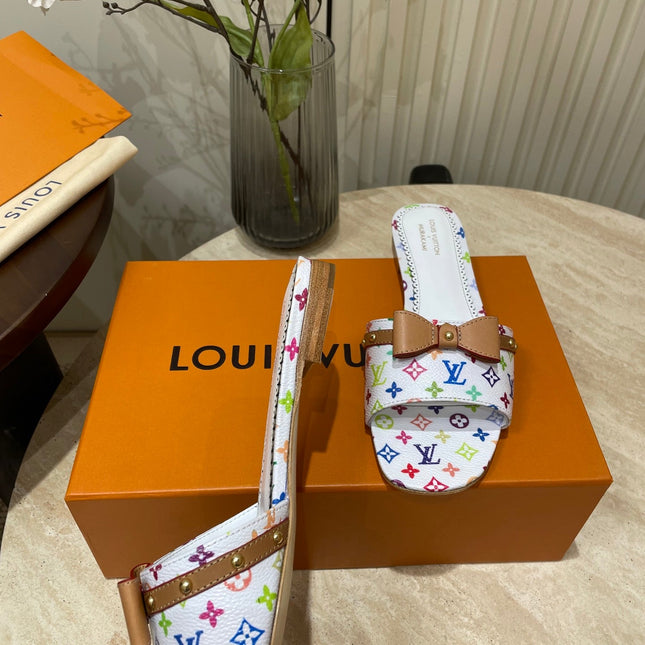 FLAT MULES IN WHITE MONOGRAM LAMBSKIN