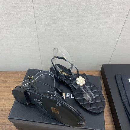CC THONG SANDAL IN BLACK LAMBSKIN WITH PEARL FLOWER