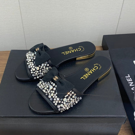 BOW SLIPPERS IN BLACK LAMBSKIN WITH RHINESTONES