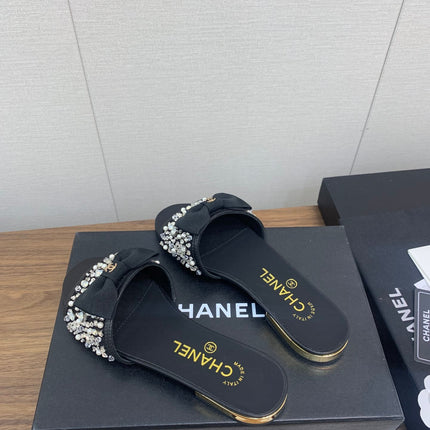 BOW SLIPPERS IN BLACK LAMBSKIN WITH RHINESTONES