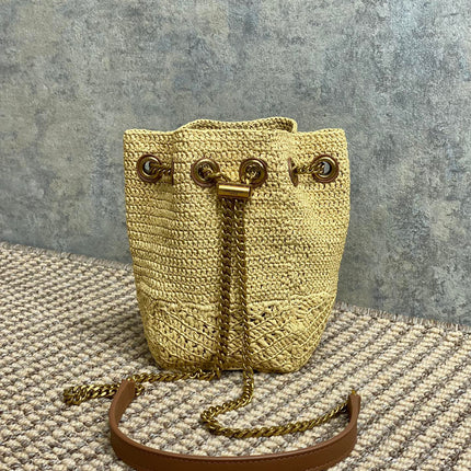 DRAWSTRING BUCKET BAG 19 IN BEIGE WOVEN RAFFIA AND CALFSKIN