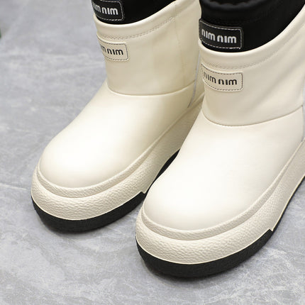 THICK-SOLED SNOW BOOTS IN WHITE CALFSKIN MIX BLACK NYLON
