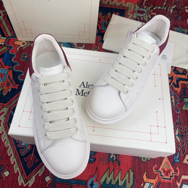 OVERSIZED SNEAKER IN WHITE CALFSKIN BURGUNDY EMBOSSED HEEL TAB