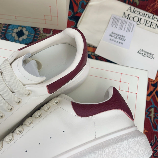 OVERSIZED SNEAKER IN WHITE CALFSKIN BURGUNDY EMBOSSED HEEL TAB