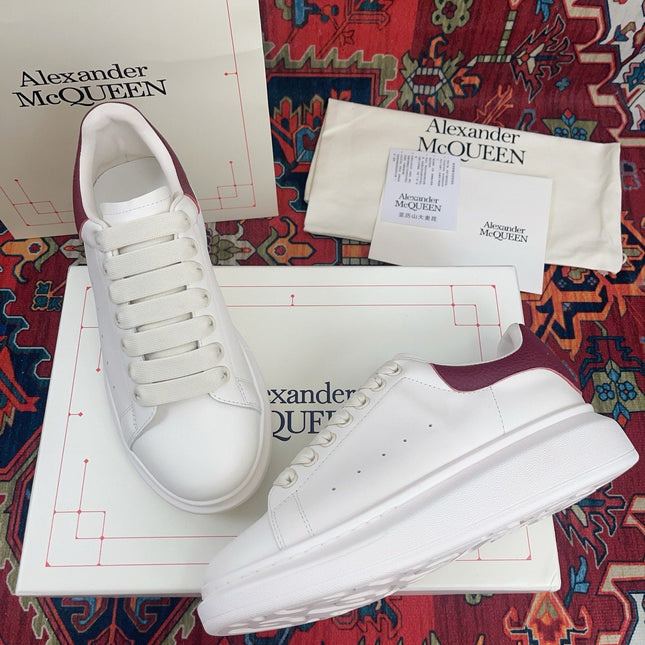 OVERSIZED SNEAKER IN WHITE CALFSKIN BURGUNDY EMBOSSED HEEL TAB