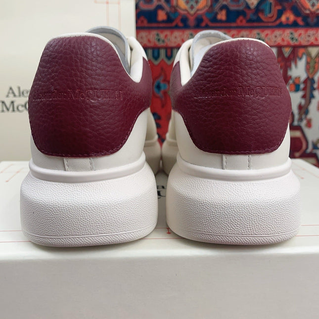 OVERSIZED SNEAKER IN WHITE CALFSKIN BURGUNDY EMBOSSED HEEL TAB