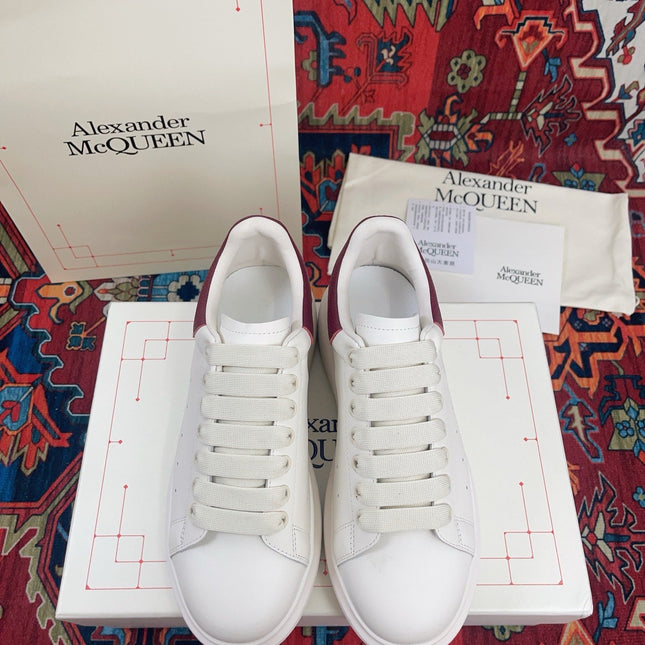 OVERSIZED SNEAKER IN WHITE CALFSKIN BURGUNDY EMBOSSED HEEL TAB