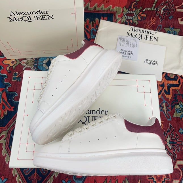 OVERSIZED SNEAKER IN WHITE CALFSKIN BURGUNDY EMBOSSED HEEL TAB