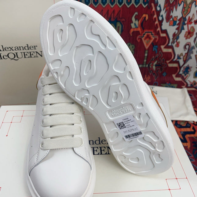 OVERSIZED SNEAKER IN WHITE CALFSKIN ORANGE HEEL TAB EMBOSSED LOGO