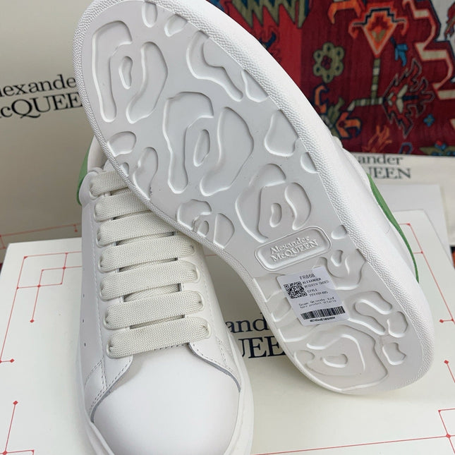 OVERSIZED SNEAKER IN WHITE CALFSKIN WITH EMBOSSED HUNTER GREEN HEEL TAB