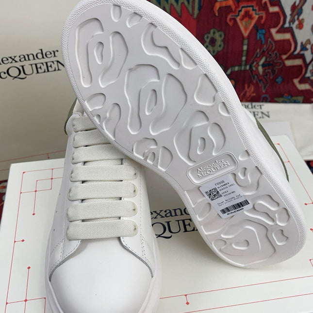 OVERSIZED SNEAKER IN WHITE CALFSKIN WITH EMBOSSED OLIVE GREEN HEEL TAB