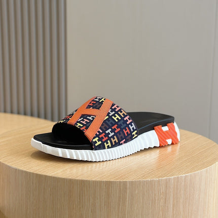 HM SLIPPERS BLACK AND NAVY MONOGRAM CANVAS