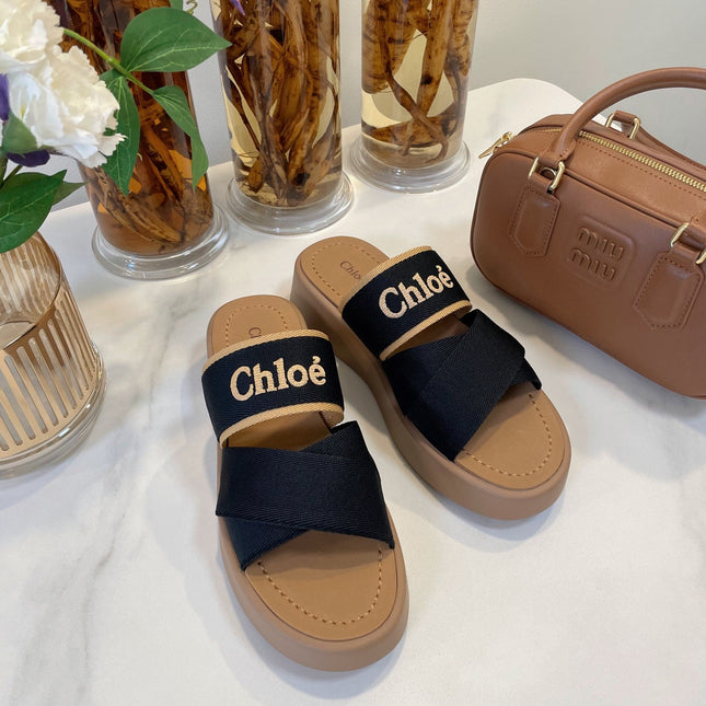 WOODY WEDGE SANDALS IN BLACK CANVAS WITH CIDER BROWN RUBBER SOLE