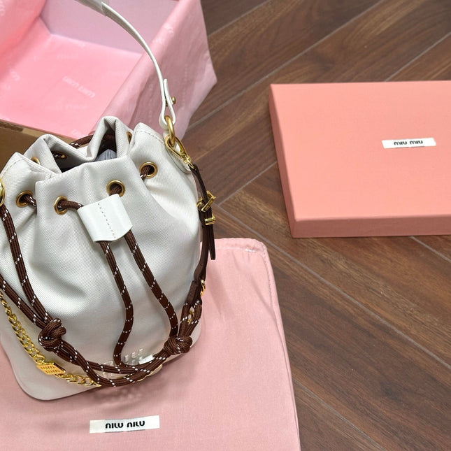 DRAWSTRING BUCKET BAG 21 IN WHITE CANVAS GOLD HARDWARE