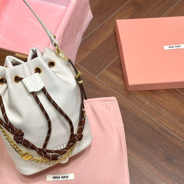 DRAWSTRING BUCKET BAG 21 IN WHITE CANVAS GOLD HARDWARE