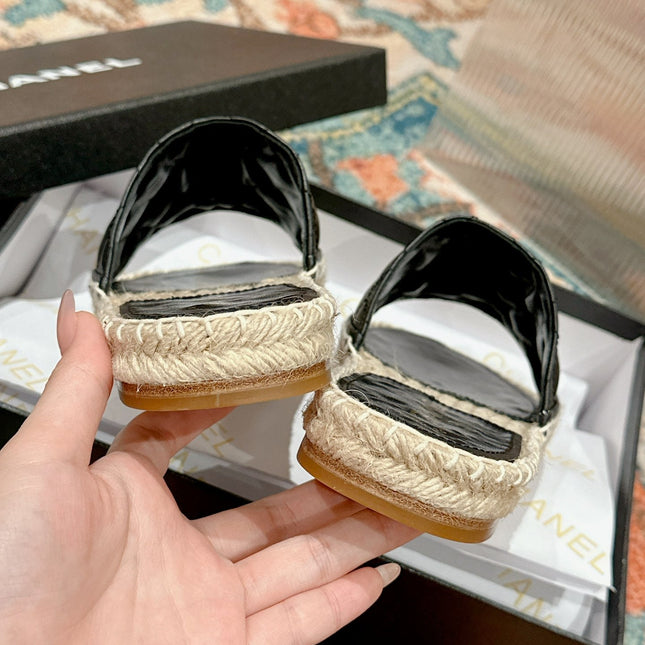 FLAT SLIPPERS IN BLACK LAMBSKIN AND WOVEN WITH LOGO