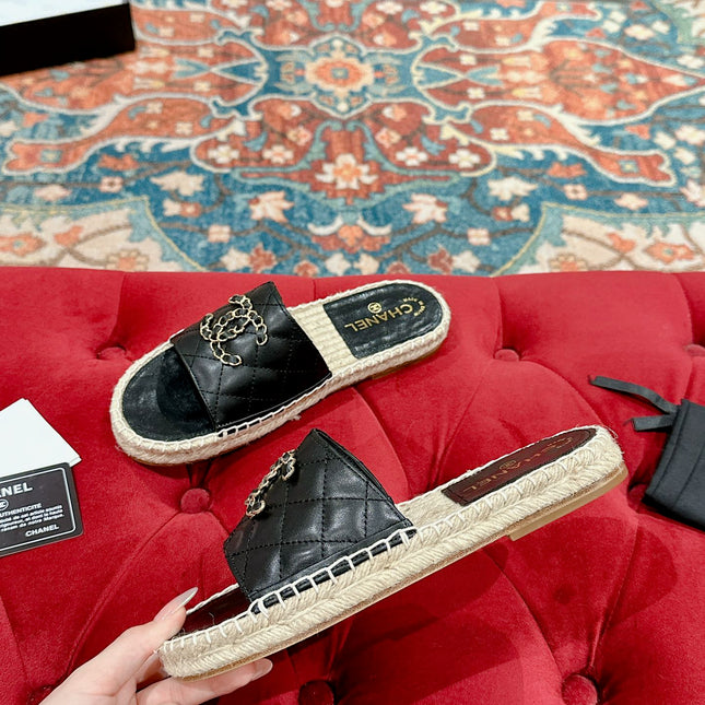 FLAT SLIPPERS IN BLACK LAMBSKIN AND WOVEN WITH LOGO