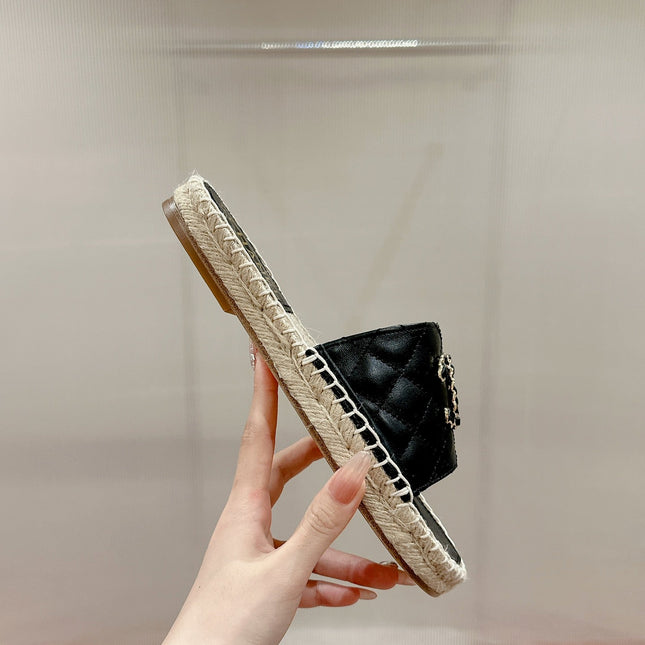 FLAT SLIPPERS IN BLACK LAMBSKIN AND WOVEN WITH LOGO