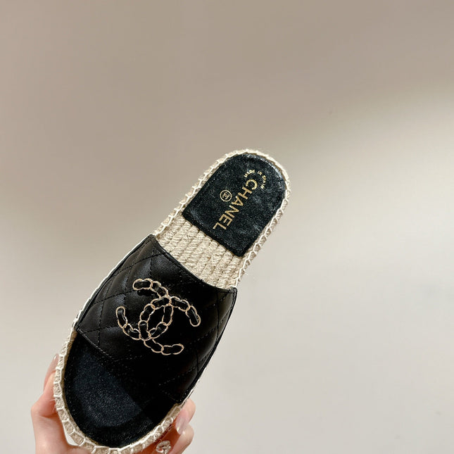 FLAT SLIPPERS IN BLACK LAMBSKIN AND WOVEN WITH LOGO