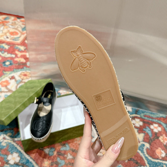 GG CROSS STRAP FLAT SHOES IN BLACK CALFSKIN WITH STRAW SOLE