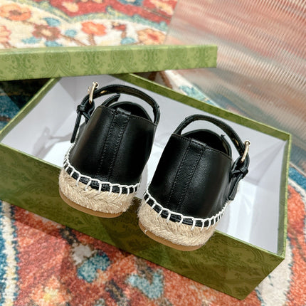GG CROSS STRAP FLAT SHOES IN BLACK CALFSKIN WITH STRAW SOLE