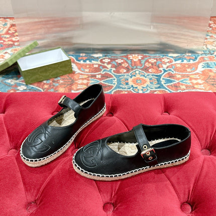 GG CROSS STRAP FLAT SHOES IN BLACK CALFSKIN WITH STRAW SOLE