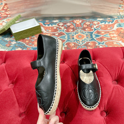 GG CROSS STRAP FLAT SHOES IN BLACK CALFSKIN WITH STRAW SOLE