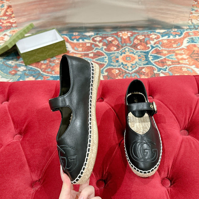 GG CROSS STRAP FLAT SHOES IN BLACK CALFSKIN WITH STRAW SOLE