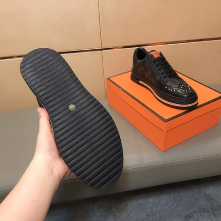 LV TRAINER IN BLACK MONOGRAM CALFSKIN
