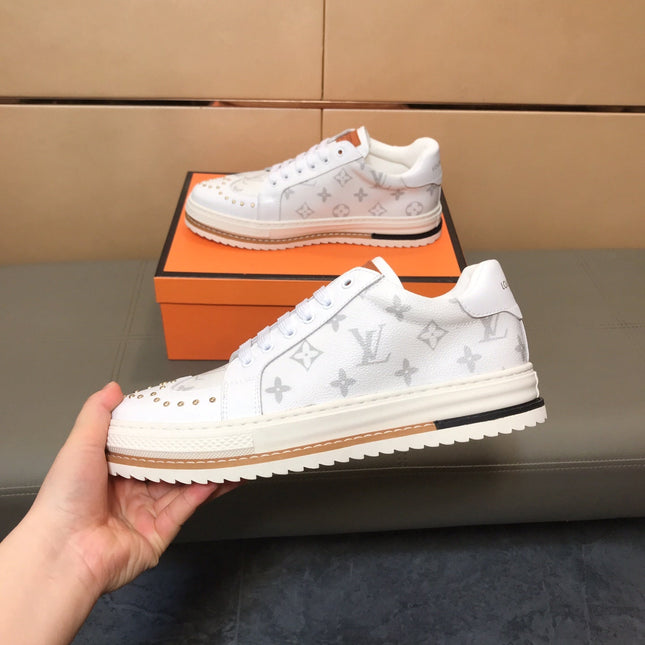 LV TRAINER IN WHITE MONOGRAM CALFSKIN