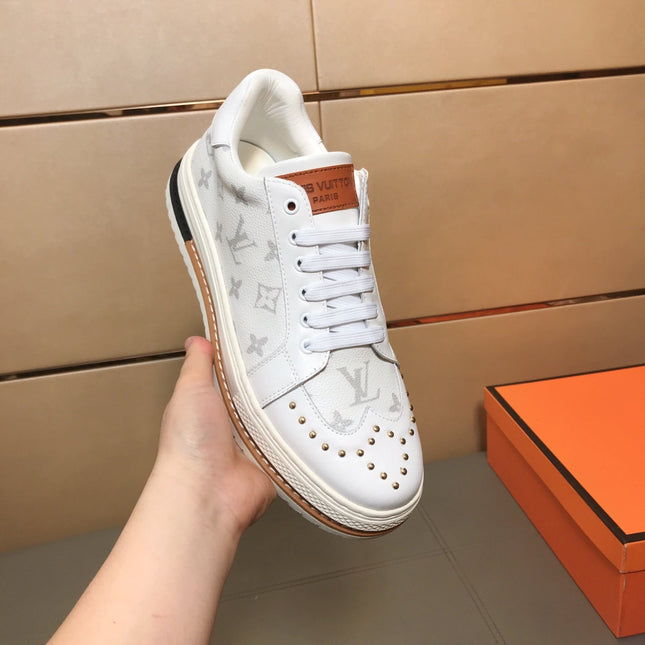 LV TRAINER IN WHITE MONOGRAM CALFSKIN
