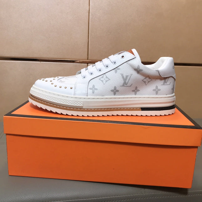 LV TRAINER IN WHITE MONOGRAM CALFSKIN