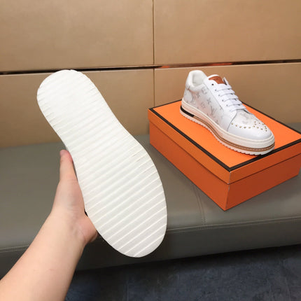 LV TRAINER IN WHITE MONOGRAM CALFSKIN