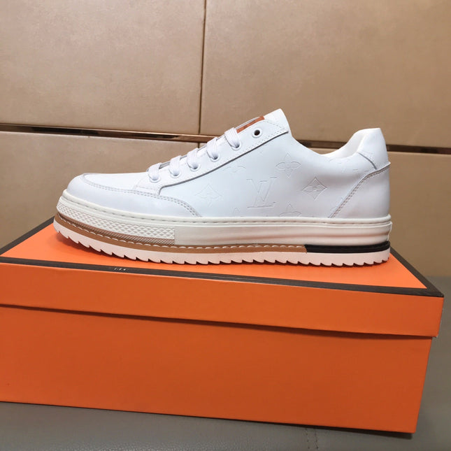 LV TRAINER IN EMBOSSED WHITE SUEDE