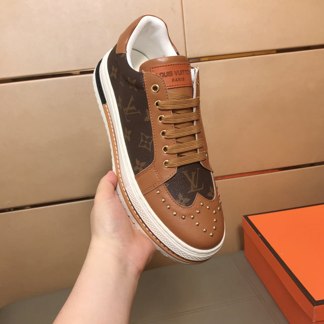 LV TRAINER IN BROWN MONOGRAM CALFSKIN