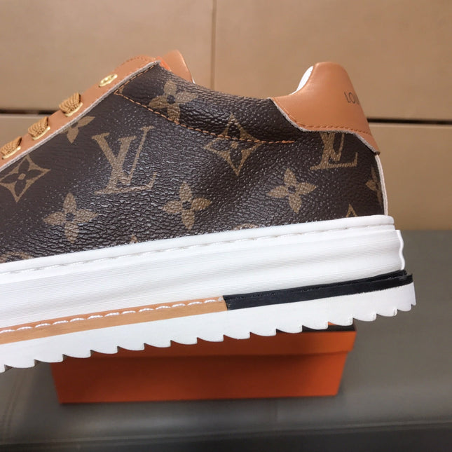 LV TRAINER IN BROWN MONOGRAM CALFSKIN