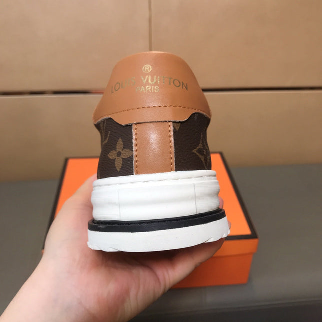 LV TRAINER IN BROWN MONOGRAM CALFSKIN