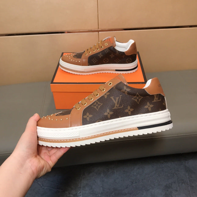 LV TRAINER IN BROWN MONOGRAM CALFSKIN