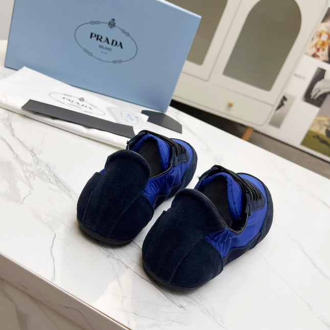 COLLAPSE SNEAKERS IN BLUE SUEDE AND NYLON
