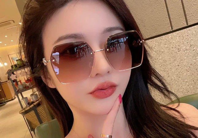 MONTAIGNE SUNGLASS CD3022 IN BROWN METAL