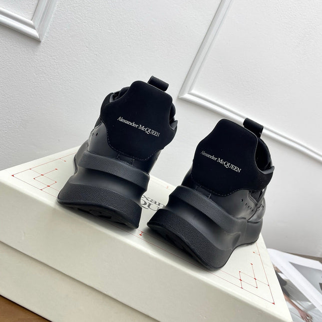 OVERSIZED RUNNER SNEAKERS IN BLACK CALFSKIN AND FABRIC