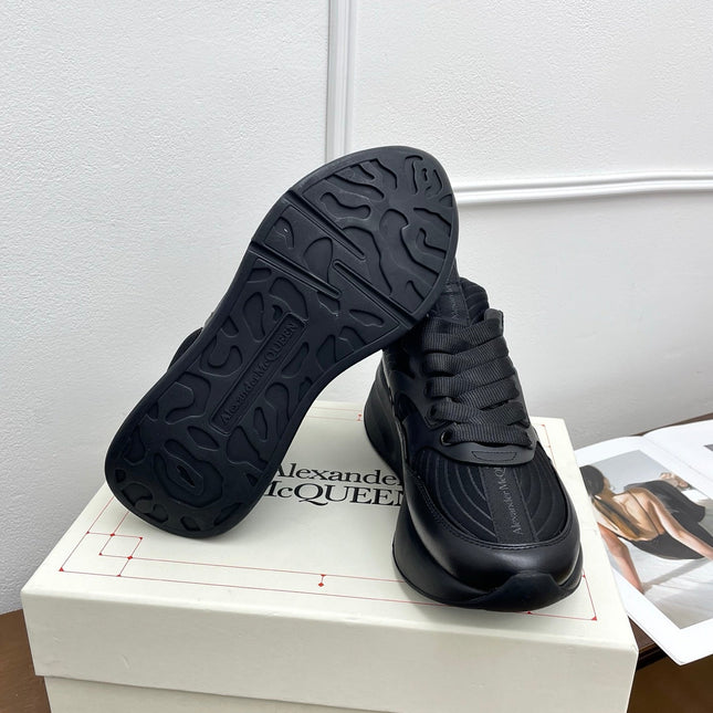 OVERSIZED RUNNER SNEAKERS IN BLACK CALFSKIN AND FABRIC