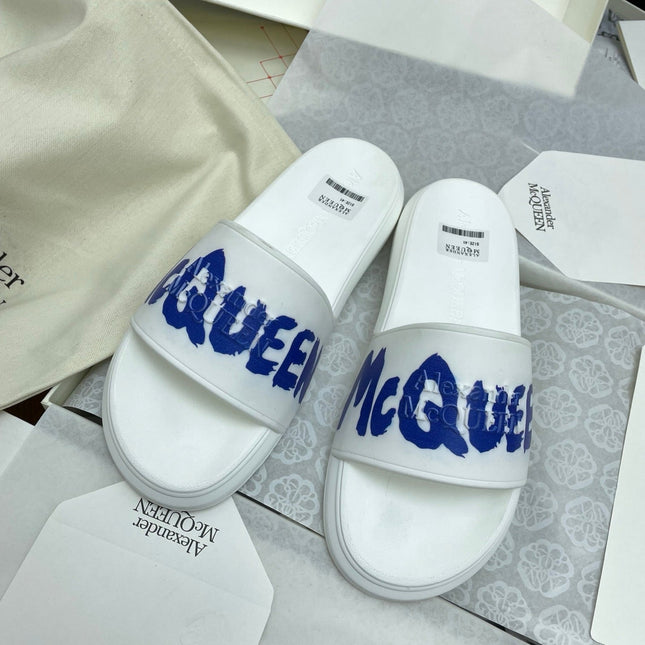 SLIDES SANDAL IN WHITE WITH BLUE LOGO GRAPHIC IN STRAP
