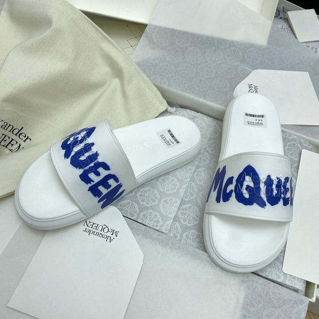 SLIDES SANDAL IN WHITE WITH BLUE LOGO GRAPHIC IN STRAP