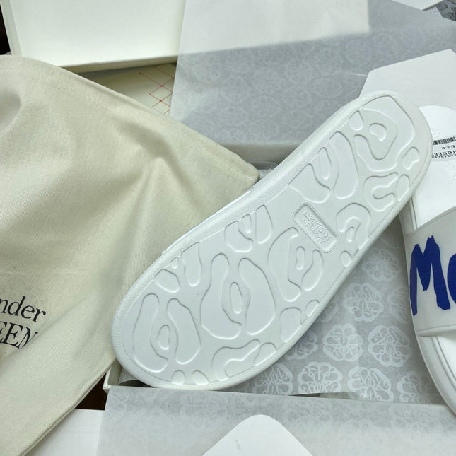 SLIDES SANDAL IN WHITE WITH BLUE LOGO GRAPHIC IN STRAP