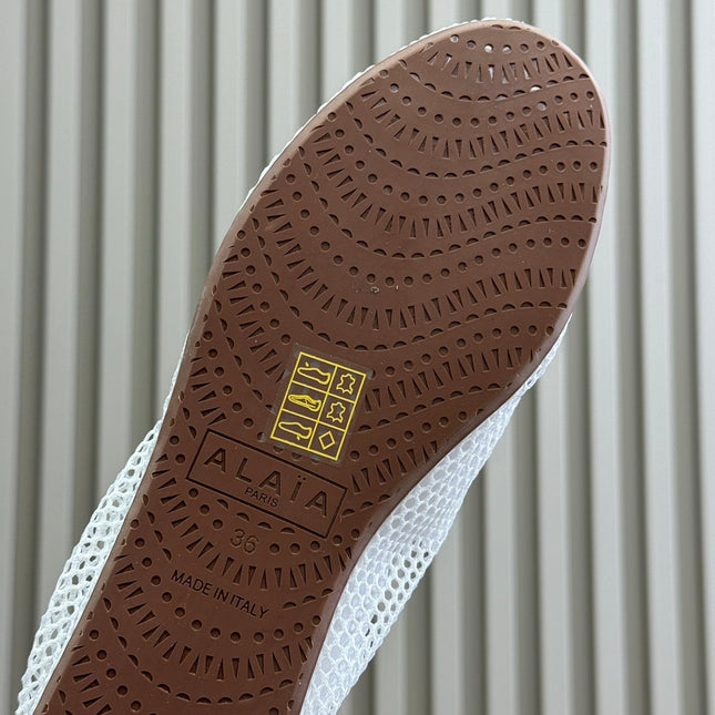 ALAIA FISHNET MESH BALLET FLATS 25S IN WHITE FABRIC