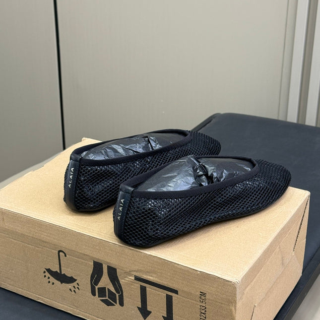 ALAIA FISHNET MESH BALLET FLATS 25S IN BLACK FABRIC