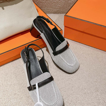 INFINIE 50 PUMP BLACK AND WHITE LAMBSKIN