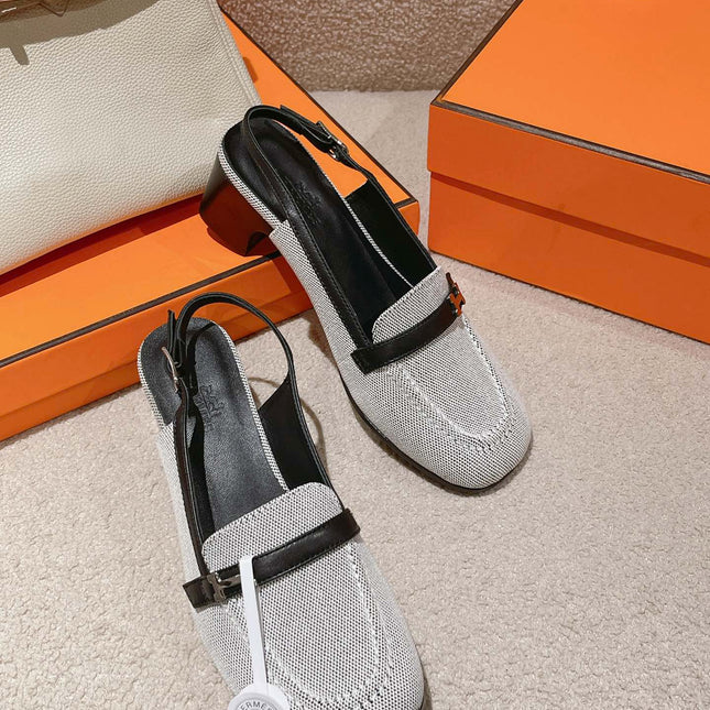 INFINIE 50 PUMP BLACK AND WHITE LAMBSKIN