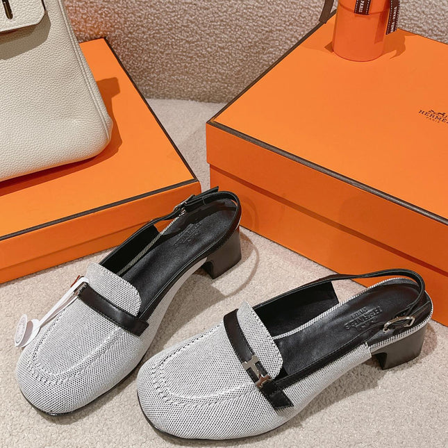 INFINIE 50 PUMP BLACK AND WHITE LAMBSKIN